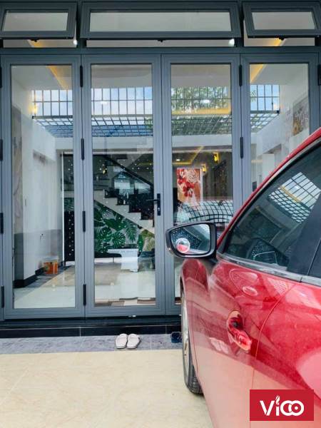 Nhà đẹp 100m2 1 trệt 2 lầu ,4 PN ngay TT Thủ Dầu Một giá rẻ , sổ hông riêng