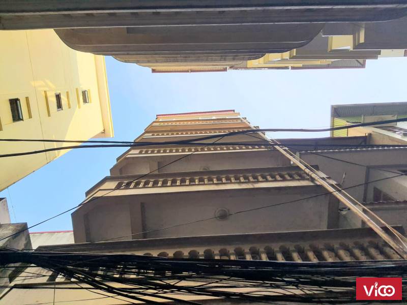 Bán nhà nghỉ hoàng quốc việt 7 tầng 12 phòng 12,3 tỷ, DT 100 triệu/ tháng