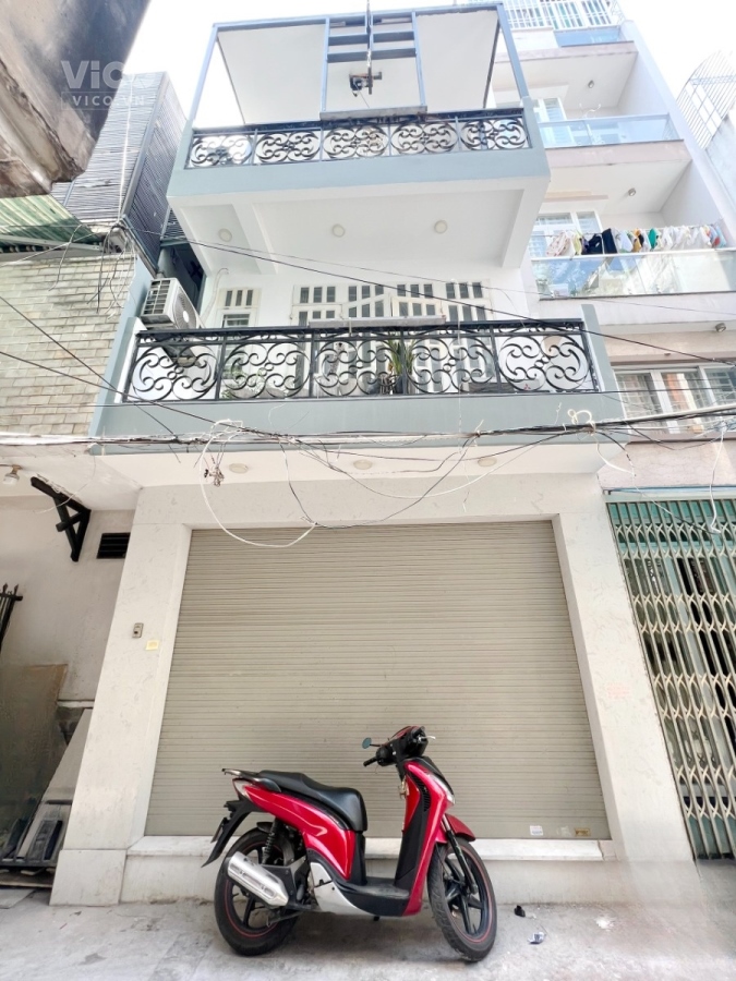 Nhà bán 5x10 trệt/2 lầu ngay chợ hẻm xe hơi đường Nguyễn Kim P6Q10