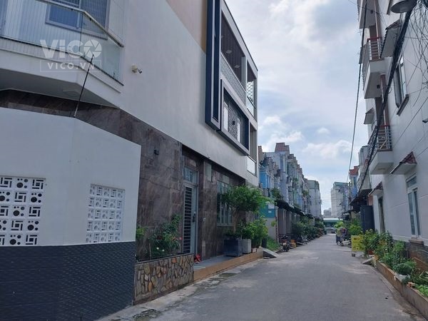 Bán gấp CHDV 3 tầng , DTCN 157m 12 PN hẻm hai xe tải, Vườn Lài An Phú Đông
