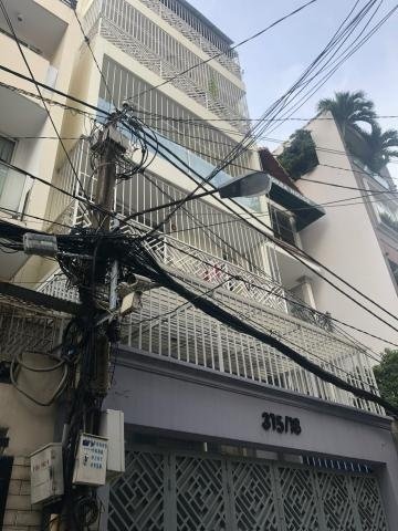 Hxh 315/18 Lê Văn Sỹ, P.13, Q3, 6.2x18m, trệt, 7 tầng, thang máy, hđ thuê 50tr/tháng